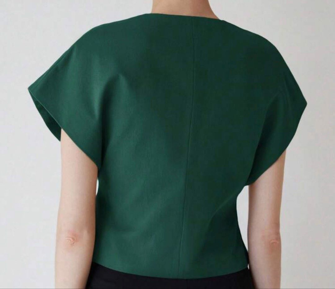 Embroidered Vest Shirt (Category: Blouses) located in Manila. Submitted by k4eli (Listing ID 1421862817, Image 2). Description: - Green top with unique embroidered design - V-neck and short, cap-like sleeves - Intricate embroidery on the front - Single gold button closure.