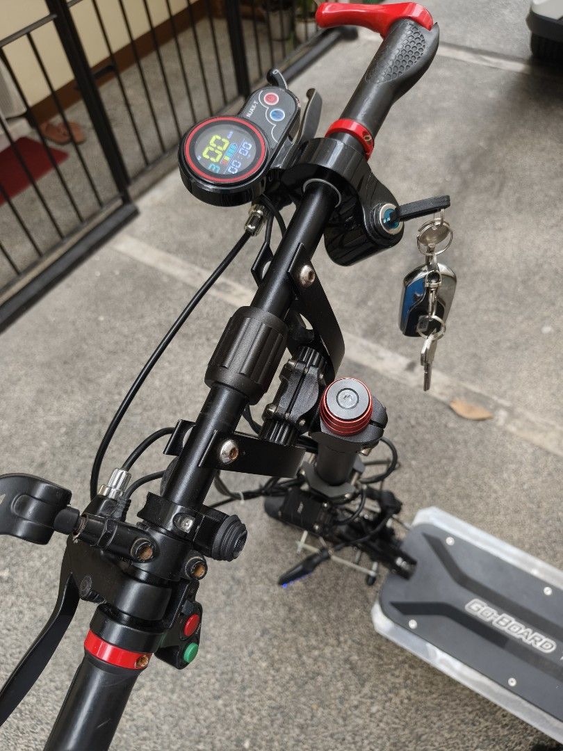 Go Board Titan Electric Scooter (Category: Skates, Rollerblades & Scooters) located in Mandaluyong City. Submitted by boyett (Listing ID 1421844814, Image 3). Description: - Go Board Titan electric scooter 48 volts -upgraded to 1000 watts motor -brand new electric motor, controller and trottle -brand new front and rear wheel -upgraded battery pack 20AH Li-Ion battery, BMS with Bluetooth to to monitor SOC via mobile app - Digital display (speed & 
