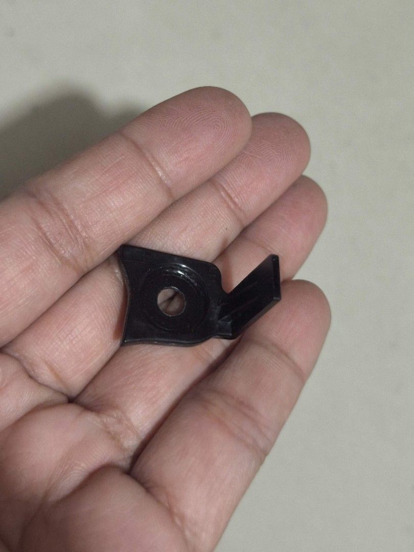 GoPro Mounts and Accessories (Category: Cameras) located in Taguig. Submitted by juliestjuly (Listing ID 1421813167, Image 2). Description: Includes various GoPro mounts and accessories. Features a black plastic mount with a 'REMOVE' label, adhesive pads, and other mounting components. Perfect for attaching your GoPro camera to different surfaces. Includes a variety of pieces for versatile mounting options..