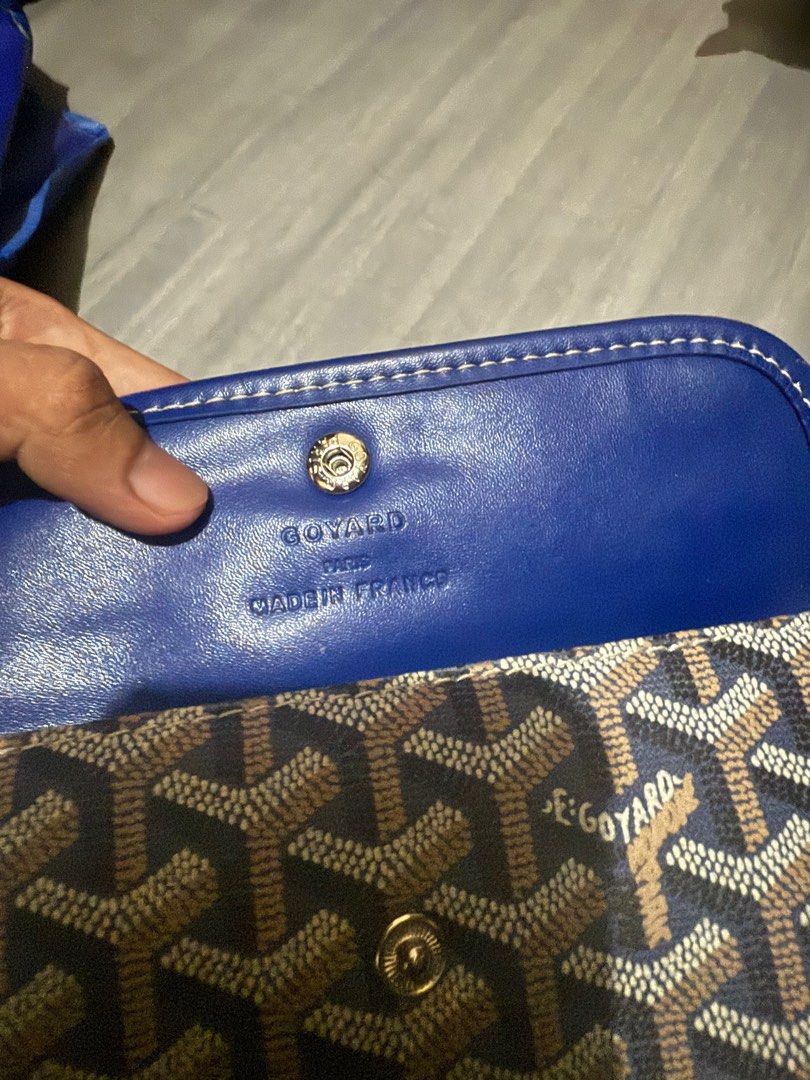 Goyard Wallet (Category: Luxury Bags & Wallets) located in Cagayan de Oro. Submitted by twice.but.nice.blackmarket (Listing ID 1421876805, Image 3). Description: - Authentic Goyard wallet - Signature Goyardine canvas with blue leather trim - Blue leather interior - Goyard Paris Made in France stamp - Snap closure Flaws: May naputol na something na hawakan or steel sa likod search nyu nalang Ang original para ma identity po ninyu salamat. The desc