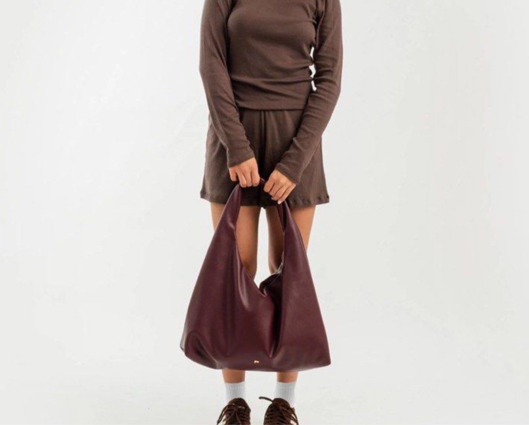 GVN Large Hobo Bag in Espresso (Category: Shoulder Bags) located in Davao. Submitted by declutterstuff01 (Listing ID 1421888399, Image 2). Description: - GVN hobo bag - Color: Espresso - Texture: Heavy pebbled - Design: Spacious - Closure: Zipper (flaw, never repaired) - Strap: Single shoulder strap - Versatile for everyday use fits macbook, laptop, ipad, etc. v spacious FREE SF FOR 1,750 can haggle but pay ur own sf.