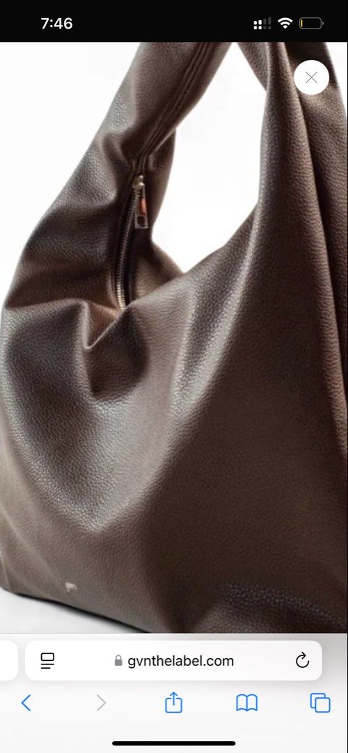 GVN Large Hobo Bag in Espresso (Category: Shoulder Bags) located in Davao. Submitted by declutterstuff01 (Listing ID 1421888399, Image 1). Description: - GVN hobo bag - Color: Espresso - Texture: Heavy pebbled - Design: Spacious - Closure: Zipper (flaw, never repaired) - Strap: Single shoulder strap - Versatile for everyday use fits macbook, laptop, ipad, etc. v spacious FREE SF FOR 1,750 can haggle but pay ur own sf.