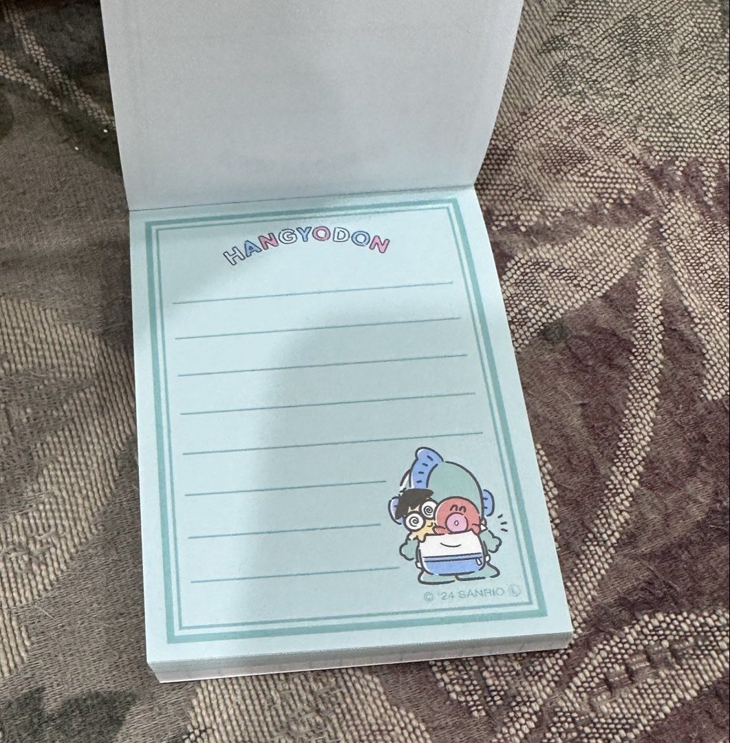 Hangyodon Mini Memo Pad (Category: Stationery & School Supplies) located in Manila. Submitted by mybeadshop (Listing ID 1421833980, Image 2). Description: - Adorable Hangyodon memo pad! - Features a cute Hangyodon design. - Includes lined pages for easy writing. - Also has a grid pattern. - Great for any Sanrio fan!.