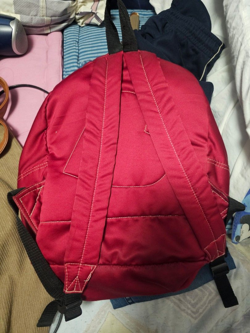 Heartstrings Red Backpack (Category: Backpacks) located in Antipolo. Submitted by 1ceb3rg (Listing ID 1421821448, Image 2). Description: - Red Heartstrings backpack - Multiple zippered compartments for storage - Adjustable shoulder straps - Top handle - Durable, possibly water-resistant material - Classic design, perfect for everyday use.