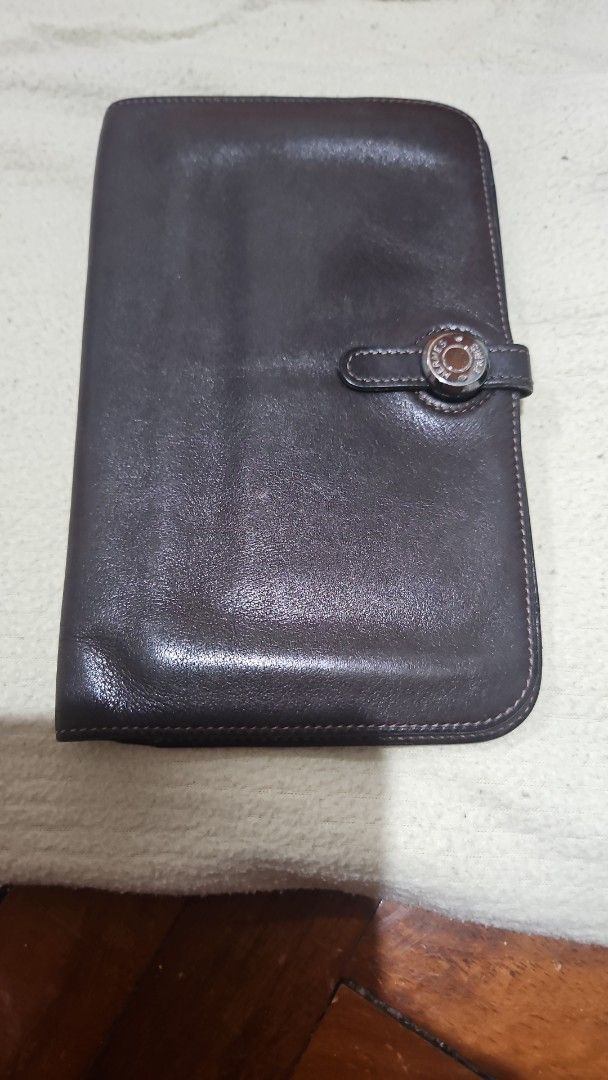Hermes Leather Wallet (Category: Luxury Bags & Wallets) located in Manila. Submitted by allysa_trinkets (Listing ID 1421899780, Image 1). Description: - Authentic Hermes leather wallet - Dark brown color - Snap closure with Hermes logo - Multiple compartments - Removable coin purse - Made in France.