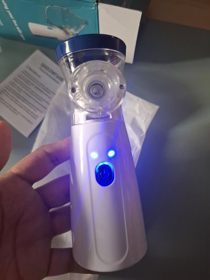 Kit - Nebulizer (Category: Medical Supplies & Tools) located in Quezon City. Submitted by an.marie (Listing ID 1421844277, Image 2). Description: Portable mesh nebulizer for easy breathing. Comes with everything you need: manual, quick start guide, USB cable, and batteries. Simple blue power button..
