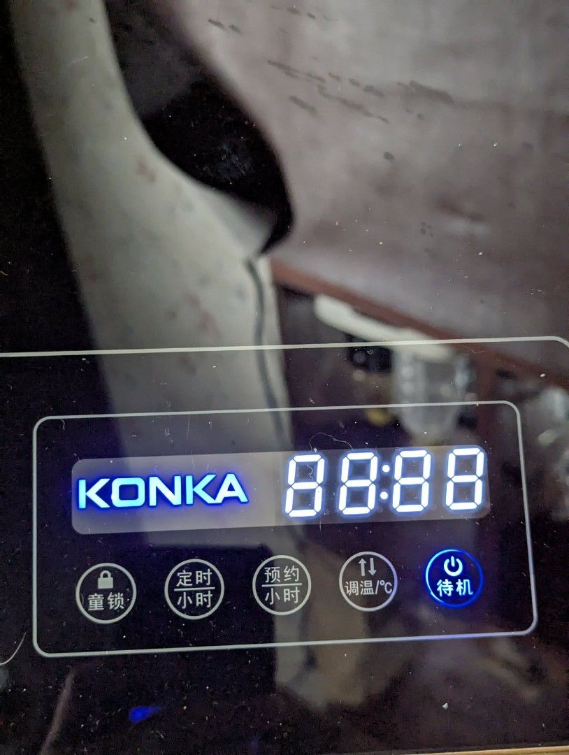 Konka Food Warming Board KH-GR2016 (Category: Other Kitchenware & Tableware) located in Baguio. Submitted by shmily01 (Listing ID 1421848885, Image 2). Description: Konka food warming board, model KH-GR2016. It has a digital display and control buttons. The board is black with a glass surface. It operates on 220V and has a power rating of 300W. The serial number is NO.GR2016201204157. The dimensions are approximately 40cm x 49cm..