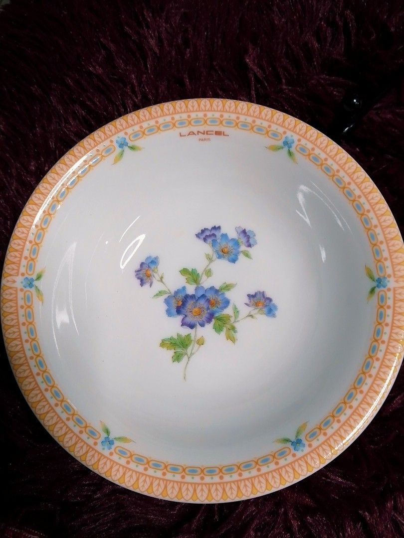 Lancel Floral Design Bowls (Category: Dinnerware & Cutlery) located in Cabanatuan. Submitted by miss.maia (Listing ID 1421855386, Image 3). Description: Set of Lancel bowls featuring floral designs. Each bowl has a decorative border. The bowls are white with various flower patterns in the center. The bowls are made in Japan. The diameter of the bowls is approximately 7 inches..