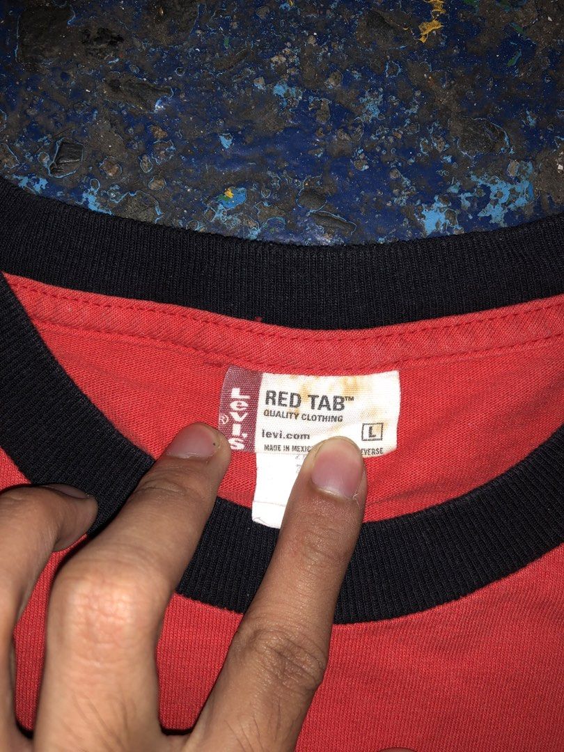 LEVI’ RED TAB RINGER T SHIRT (Category: Tshirts & Polo Shirts ) located in Manila. Submitted by fleis.it (Listing ID 1421883837, Image 3). Description: - Authentic Levi's Red Tab ringer T-shirt - Classic design with red body and black collar - Features the iconic Levi's logo - Size: Large - Made in Mexico.