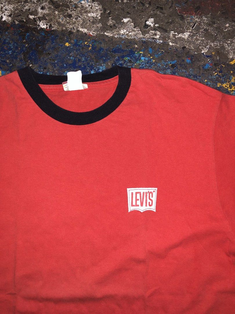 LEVI’ RED TAB RINGER T SHIRT (Category: Tshirts & Polo Shirts ) located in Manila. Submitted by fleis.it (Listing ID 1421883837, Image 2). Description: - Authentic Levi's Red Tab ringer T-shirt - Classic design with red body and black collar - Features the iconic Levi's logo - Size: Large - Made in Mexico.