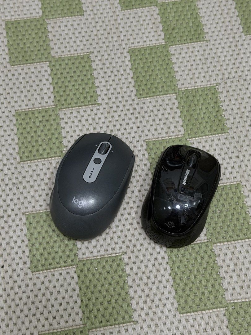 Logitech and Microsoft Wireless Mouse (Category: Mouse & Mousepads) located in Taguig. Submitted by issa23fourfive (Listing ID 1421865876, Image 1). Description: - Available: Wireless Logitech and Microsoft mice Logitech Mouse: P500 - Color: Dark Gray - Features: Power switch, battery indicator Microsoft Mouse: P400 - Color: Black - Features: Glossy finish.