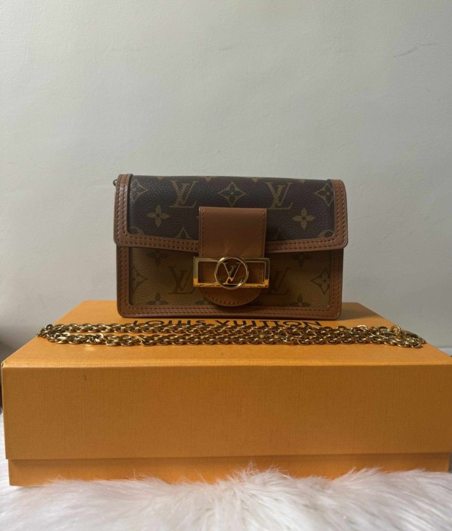 Louis Vuitton Dauphine Mini Bag (Category: Luxury Bags & Wallets) located in Las Pinas. Submitted by liezel49 (Listing ID 1421793612, Image 1). Description: Features Monogram canvas, leather trim, gold chain, and clasp closure. Includes original box. Made in France.Used twice only.