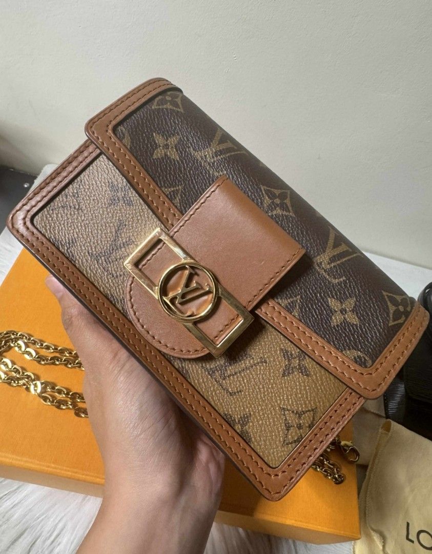 Louis Vuitton Dauphine Mini Bag (Category: Luxury Bags & Wallets) located in Las Pinas. Submitted by liezel49 (Listing ID 1421793612, Image 3). Description: Features Monogram canvas, leather trim, gold chain, and clasp closure. Includes original box. Made in France.Used twice only.