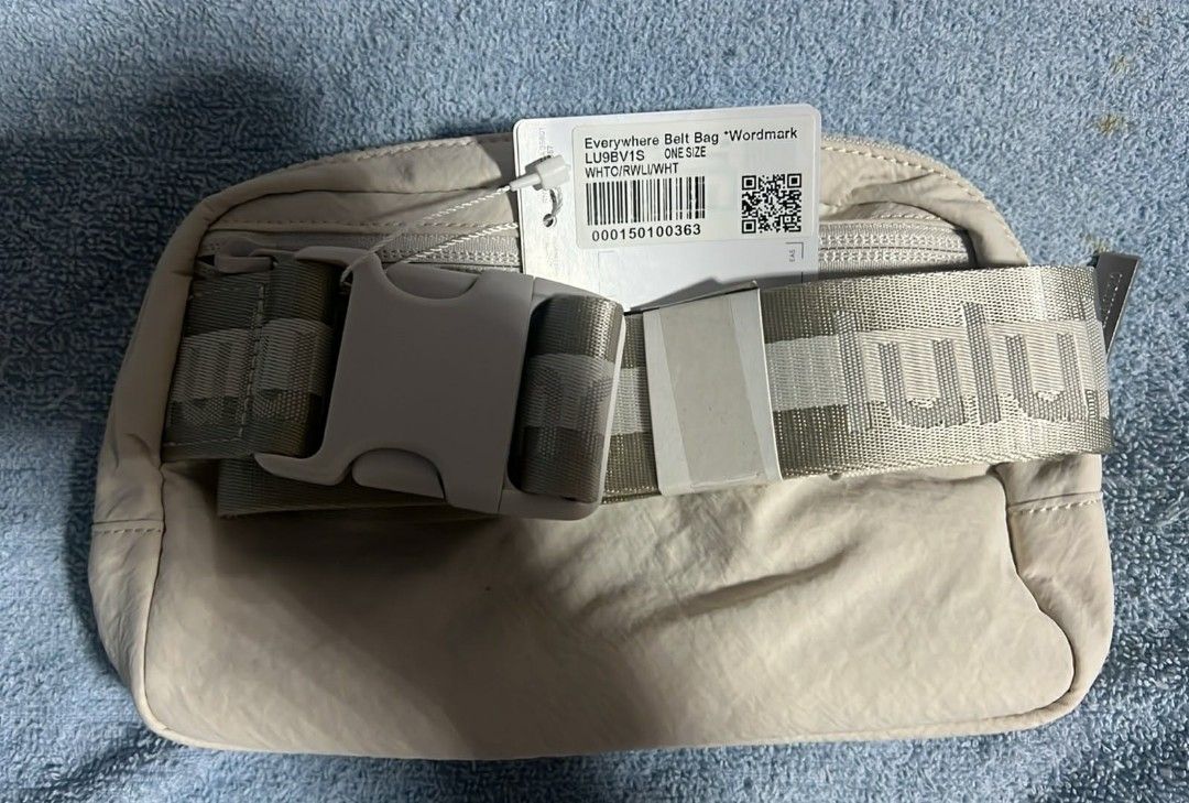 Lululemon Everywhere Belt Bag - White Opal (Category: Cross-body Bags) located in Manila. Submitted by jayveecatu14021 (Listing ID 1421823393, Image 2). Description: - Lululemon Everywhere Belt Bag - Color: White Opal - Model: LU9819 - Zippered main compartment - Adjustable strap - Discreet Lululemon logo - Ideal for carrying essentials.