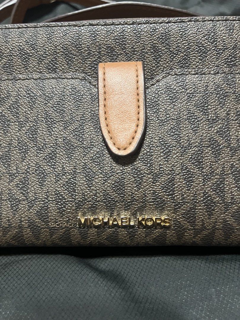 Michael Kors Crossbody Bag (Category: Cross-body Bags) located in Taguig. Submitted by stuffitlikeitshot (Listing ID 1421882868, Image 2). Description: Guaranteed ORIG from CA Double zip bag Monogram design Used a few times only Gold hardware Adjustable strap .