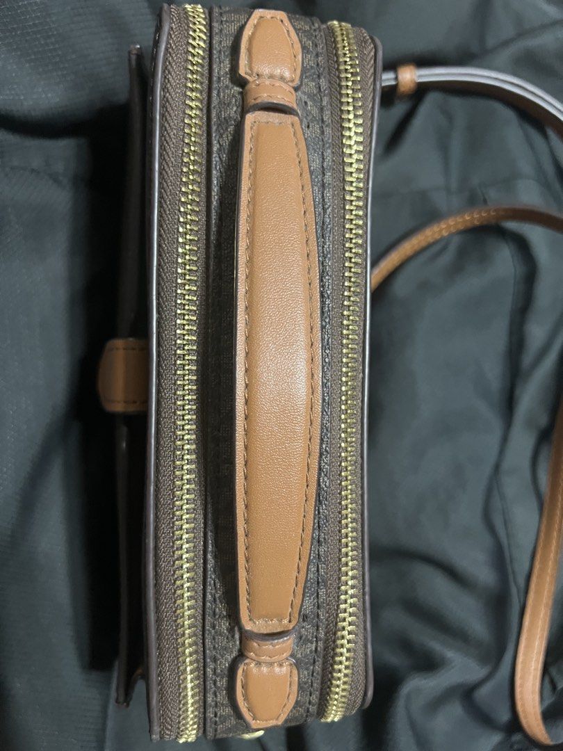 Michael Kors Crossbody Bag (Category: Cross-body Bags) located in Taguig. Submitted by stuffitlikeitshot (Listing ID 1421882868, Image 3). Description: Guaranteed ORIG from CA Double zip bag Monogram design Used a few times only Gold hardware Adjustable strap .