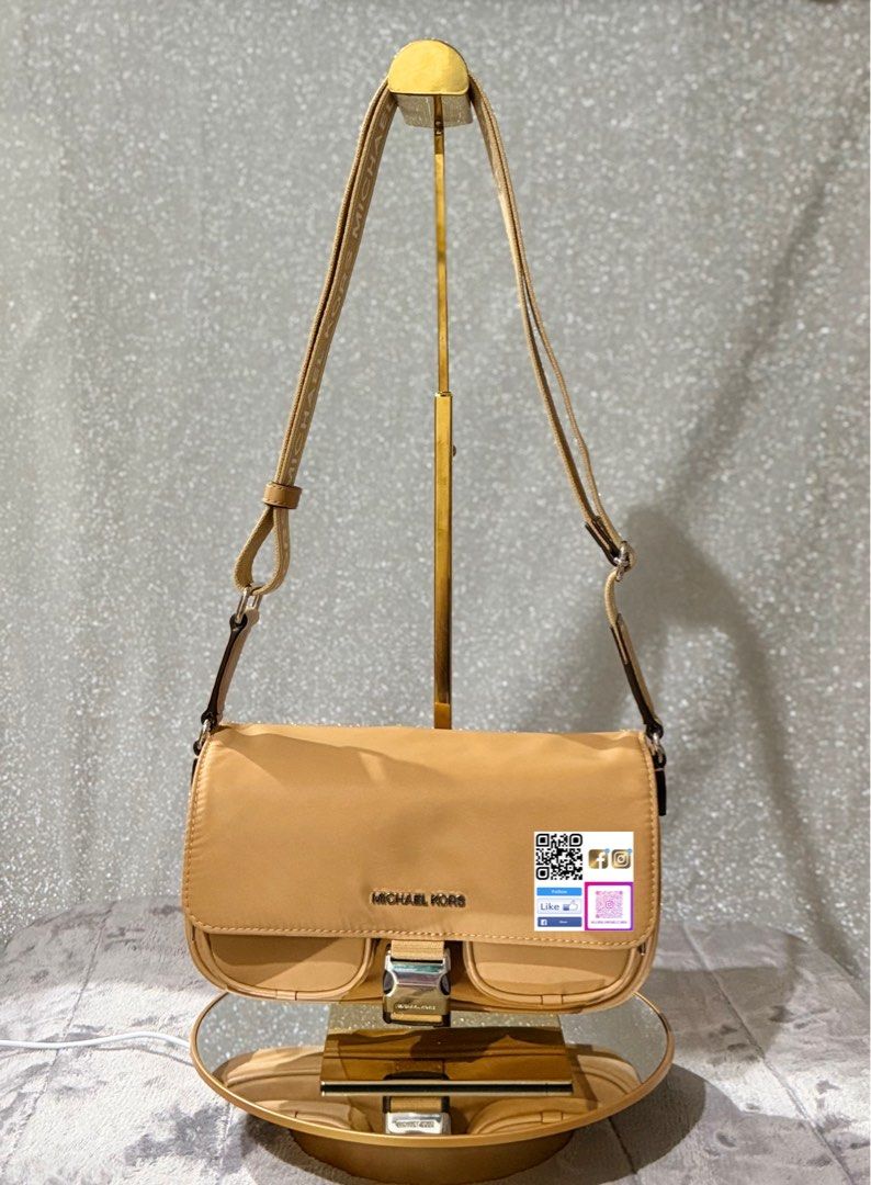 Michael Kors Shoulder Bag (Category: Luxury Bags & Wallets) located in Quezon City. Submitted by peachysexy1828 (Listing ID 1421915999, Image 1). Description: - Michael Kors shoulder bag - Available colors: tan, pink, black - Features: flap closure, buckle detail, two front pockets - Includes branded shoulder strap - Perfect for everyday or special occasions - Versatile accessory.