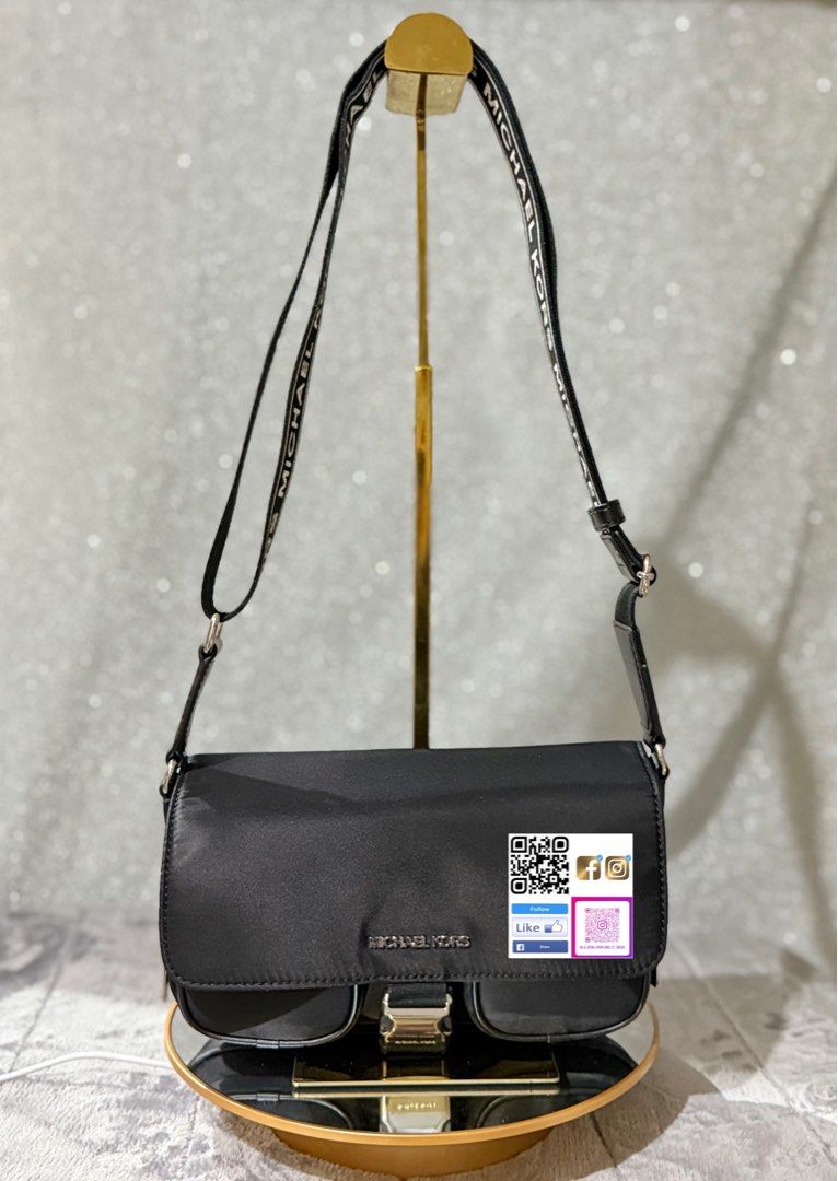 Michael Kors Shoulder Bag (Category: Luxury Bags & Wallets) located in Quezon City. Submitted by peachysexy1828 (Listing ID 1421915999, Image 3). Description: - Michael Kors shoulder bag - Available colors: tan, pink, black - Features: flap closure, buckle detail, two front pockets - Includes branded shoulder strap - Perfect for everyday or special occasions - Versatile accessory.