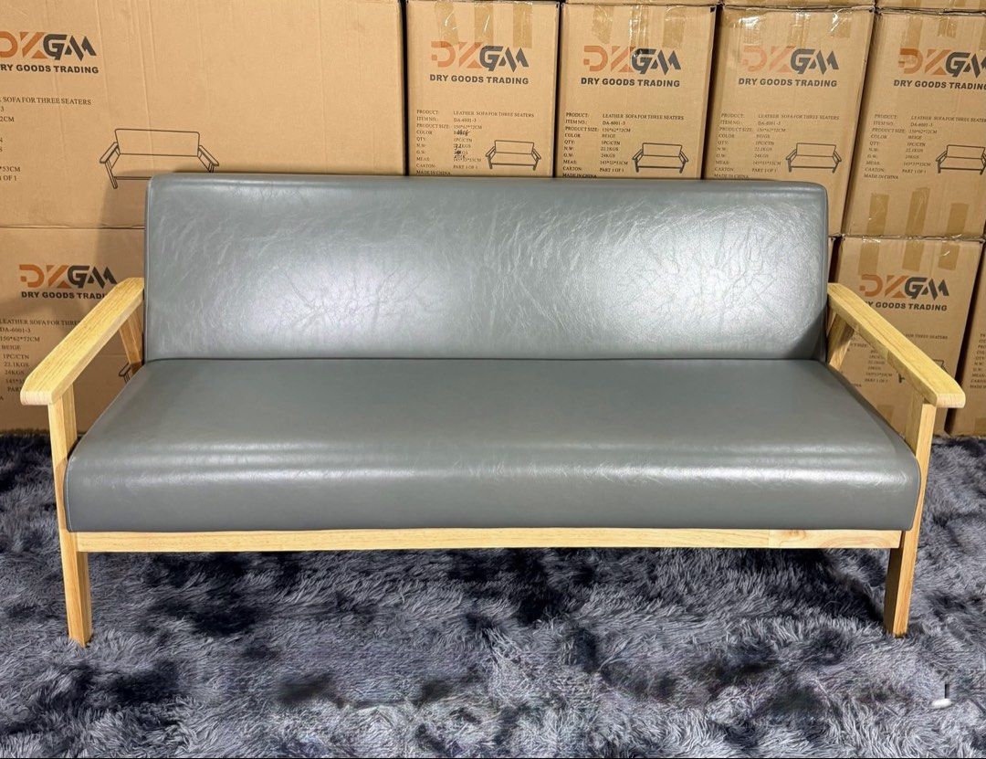Nordic Wooden Frame Sofa Set (Category: Sofas) located in Manila. Submitted by mry_rfl (Listing ID 1421936314, Image 2). Description: - Stylish sofa set - Wooden frames - Available colors: cream, grey, black - Includes single-seater armchairs and two-seater sofas - Cushions: Leather or leather-like material - Ideal for living rooms and lounges.