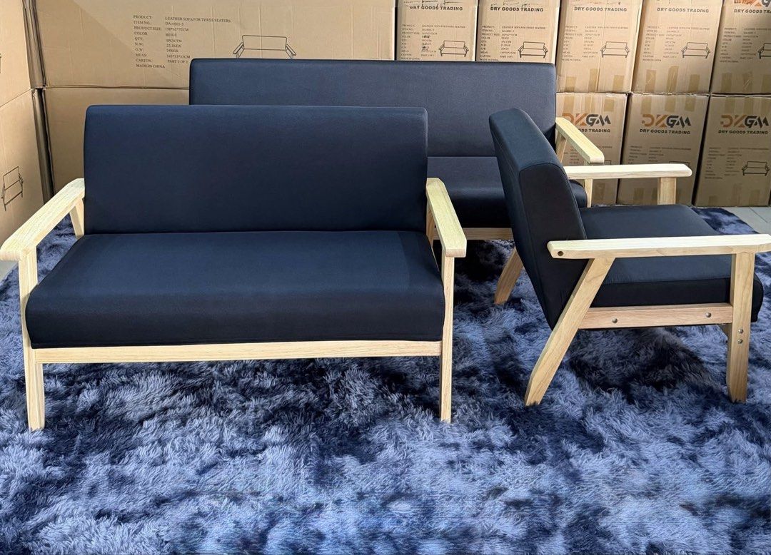 Nordic Wooden Frame Sofa Set (Category: Sofas) located in Manila. Submitted by mry_rfl (Listing ID 1421936314, Image 3). Description: - Stylish sofa set - Wooden frames - Available colors: cream, grey, black - Includes single-seater armchairs and two-seater sofas - Cushions: Leather or leather-like material - Ideal for living rooms and lounges.