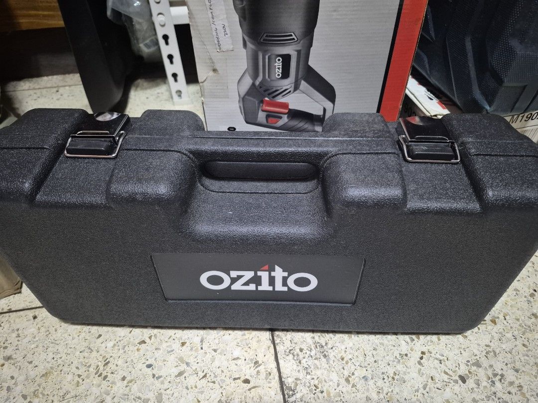 Ozito Reciprocating Saw RSW-5200 (Category: Construction Tools & Equipment) located in Paranaque City. Submitted by isay_virtualstore (Listing ID 1421940517, Image 1). Description: - Ozito 920W Reciprocating Saw - Tool-free blade change - Variable speed control - Adjustable pivoting shoe - Includes 4 blades - Comes with kit box and instruction manual - Anti-vibration overmould - Color: Black and Grey.
