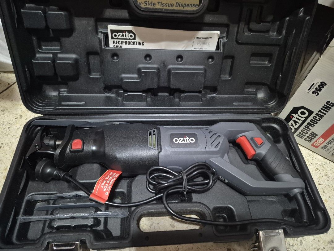 Ozito Reciprocating Saw RSW-5200 (Category: Construction Tools & Equipment) located in Paranaque City. Submitted by isay_virtualstore (Listing ID 1421940517, Image 3). Description: - Ozito 920W Reciprocating Saw - Tool-free blade change - Variable speed control - Adjustable pivoting shoe - Includes 4 blades - Comes with kit box and instruction manual - Anti-vibration overmould - Color: Black and Grey.