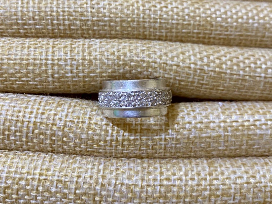 Piaget or Spinner Ring | S925 (Category: Rings) located in Solano. Submitted by silvershineph (Listing ID 1421839219, Image 1). Description: ✧ Product / Item Name: Piaget or Spinner Ring ✧ Description: A wide band ring featuring a distinctive central section with a 3-row pavé set of round-cut stones, likely cubic zirconia. ✧ Size: 5 ✧ Weight: 7.6g ✧ Details: • Genuine silver • Carefully inspected quality • Ready for shipment For inquiries or rese