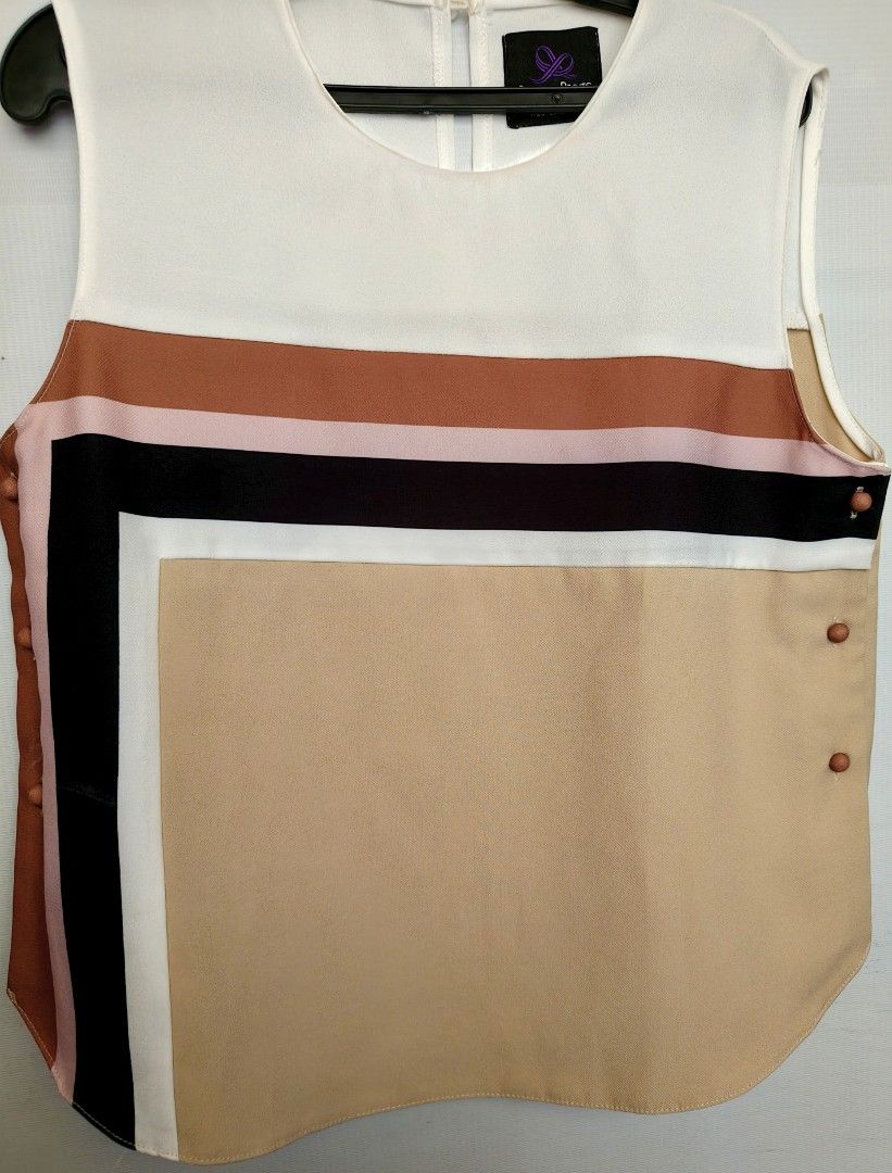 Plains & Prints Sleeveless Top and Pants Set (Category: Sets or Coordinates) located in Batangas. Submitted by 2mspreloved (Listing ID 1421809792, Image 2). Description: - Plains & Prints matching set - Sleeveless top with color-block design - Beige pants with color-block side stripes -With side pockets .