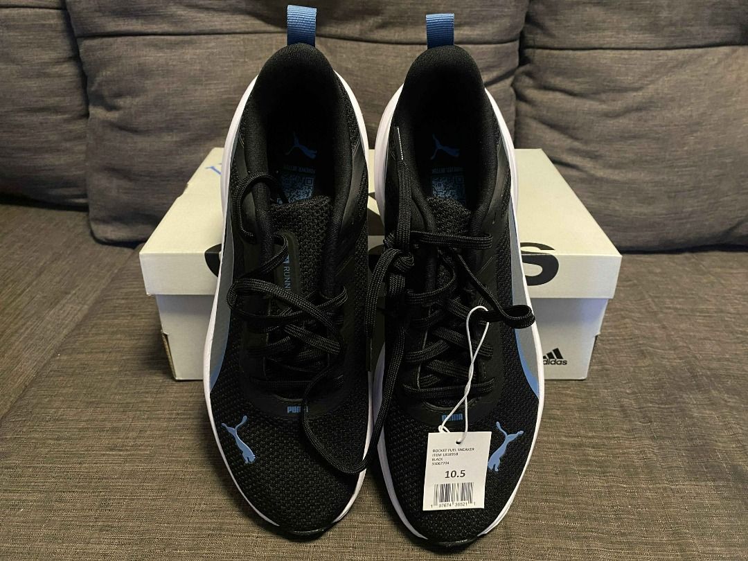 PUMA MEN'S ROCKET FUEL Running Sneakers (Category: Sneakers) located in Rizal. Submitted by TheRetailAddict (Listing ID 1421869886, Image 3). Description: - Black Puma running shoes - Blue accents - White sole - Puma logo on the side - Unworn condition (brand new) .