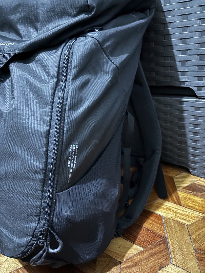 Quechua MH100 35L Backpack (Category: Backpacks) located in Guiguinto. Submitted by drlsaldi (Listing ID 1421911582, Image 2). Description: - Quechua 35L backpack but can expand upto 38-40L - Color: Black - Closure: Top flap with buckle and side zipper - Has adjustable straps - Includes side pockets - Has padded back support and waistband - Originally priced at 2,300 RFS: buying different style of travel backpack.