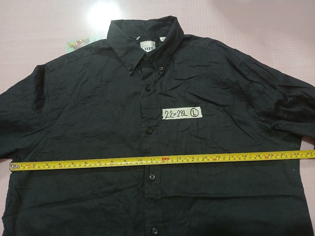 ROWM Black Long Sleeve Shirt - Size L (Category: Tshirts & Polo Shirts ) located in Caloocan City. Submitted by erickaban14 (Listing ID 1421917629, Image 3). Description: - ROWME black long sleeve shirt - Size: L - Features a button-down front - Classic collar and long sleeves - Made of textured fabric - Made in Madagascar.