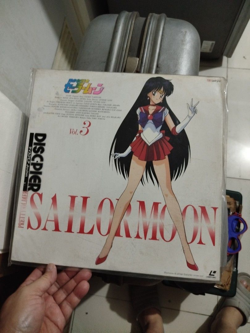 Sailor Moon laserdisc Vol. 3, 5, 6 (Category: Vinyls) located in Caloocan City. Submitted by toys_r_here (Listing ID 1421870871, Image 1). Description: 1300 each - Sailor Moon Disc Pier vinyl records - Includes Volumes 3, 5, and 6 - Features vibrant Sailor Moon character artwork - Records are in original packaging - Back of each record includes anime images and tracklist - A must-have collectible for Sailor Moon fans!.