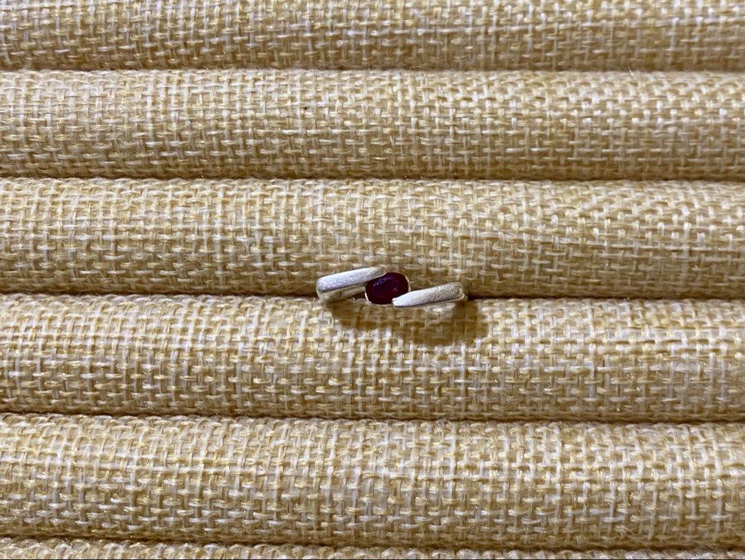 Sculptural Ring with round-cut ruby gemstone | S925 (Category: Rings) located in Solano. Submitted by silvershineph (Listing ID 1421857464, Image 1). Description: ✧ Product / Item Name: Sculptural Ring with round-cut ruby gemstone ✧ Description: The ring has a modern, sculptural, or bypass-style band where the metal ends wrap around or “embrace” the center stone. ✧ Size: 5-5.5 ✧ Weight: 3.9g ✧ Details: • Genuine silver • Carefully inspected quali