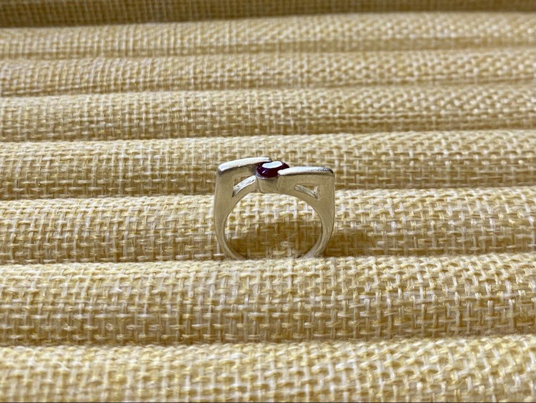 Sculptural Ring with round-cut ruby gemstone | S925 (Category: Rings) located in Solano. Submitted by silvershineph (Listing ID 1421857464, Image 3). Description: ✧ Product / Item Name: Sculptural Ring with round-cut ruby gemstone ✧ Description: The ring has a modern, sculptural, or bypass-style band where the metal ends wrap around or “embrace” the center stone. ✧ Size: 5-5.5 ✧ Weight: 3.9g ✧ Details: • Genuine silver • Carefully inspected quali