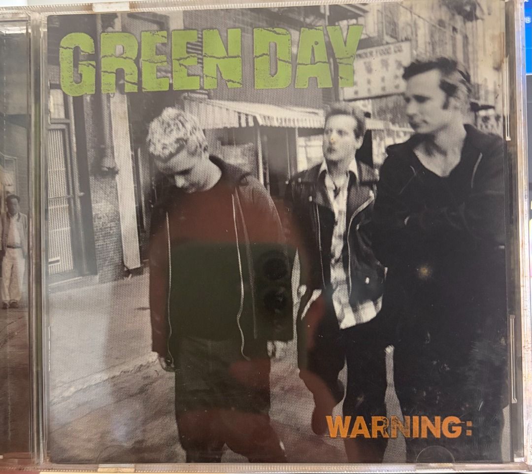 SEALED & PRELOVED: Green Day CD Albums (Category: CDs & DVDs) located in Makati City. Submitted by spinnerhoundrecords (Listing ID 1421858401, Image 1). Description: Price starts at 250 pesos. Refer to the list below for the exact price and condition of each item. Warning - VG++ - 250 pesos American Idiot w/ hype sticker, damaged case (left side) - SEALED - 250 pesos American Idiot w/ VCD, damaged case (left side) - SEALED - 300 pesos Father of A