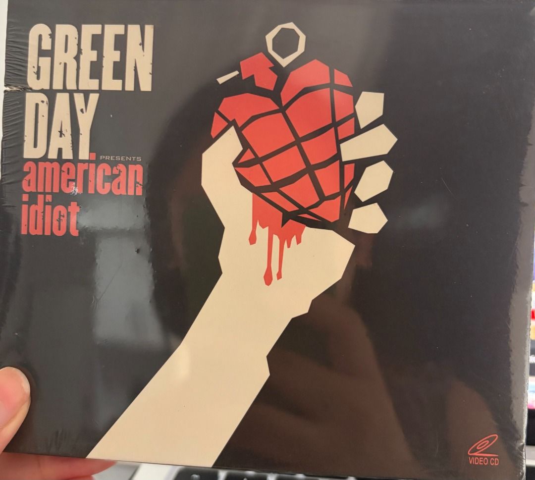 SEALED & PRELOVED: Green Day CD Albums (Category: CDs & DVDs) located in Makati City. Submitted by spinnerhoundrecords (Listing ID 1421858401, Image 3). Description: Price starts at 250 pesos. Refer to the list below for the exact price and condition of each item. Warning - VG++ - 250 pesos American Idiot w/ hype sticker, damaged case (left side) - SEALED - 250 pesos American Idiot w/ VCD, damaged case (left side) - SEALED - 300 pesos Father of A