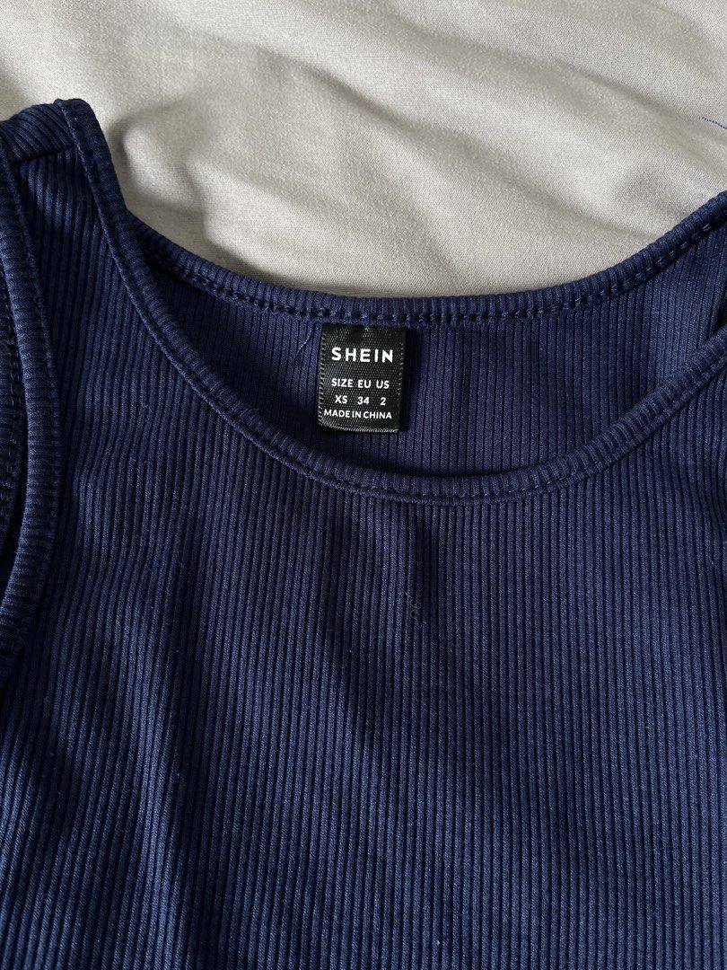 Shein Ribbed Tank Top - Navy Blue (Category: Sleeveless) located in Mandaluyong City. Submitted by leilei06 (Listing ID 1421905915, Image 2). Description: - Shein navy blue ribbed tank top - Size: XS - Color: Navy blue - Features: Scoop neck, sleeveless - Style: Casual - Fabric: Ribbed - Used once.