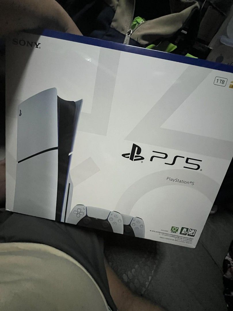 Sony PlayStation 5 Slim Console Two DualSense Wireless Controller Bundle (Category: PlayStation) located in Paranaque City. Submitted by ricocruzzz (Listing ID 1421935868, Image 1). Description: - PlayStation 5 Slim Console (Disc Version) - Includes two DualSense wireless controllers - 1TB storage capacity - Box included - No issue -Original/Authentic 100%.