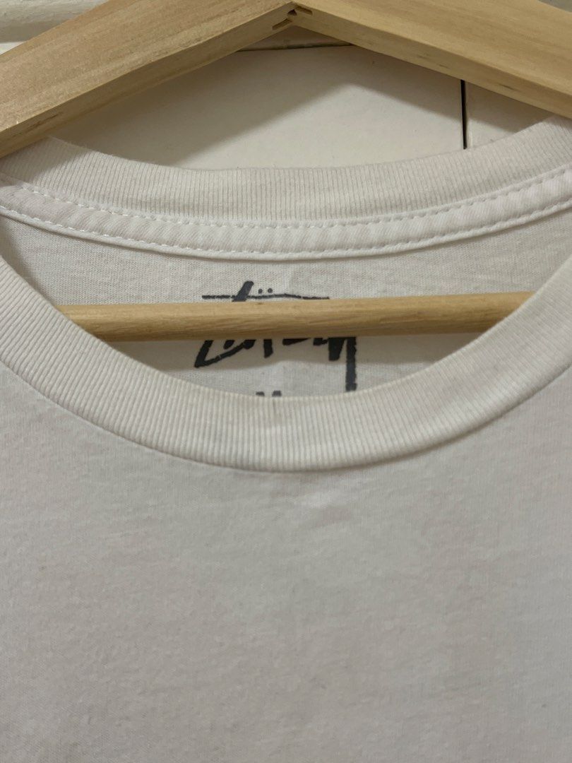 Stussy Long Sleeve Shirt (Category: Tshirts & Polo Shirts ) located in Makati City. Submitted by clothesfrombel (Listing ID 1421811973, Image 3). Description: - Stussy long sleeve shirt - Thin material, can be used as an undershirt also - Features Stussy logo (front and back) - Size: M - Crew neck - Long sleeves - good condition, see close up for minor stains pit to pit: 19” length: 25” sleeves: 23”.