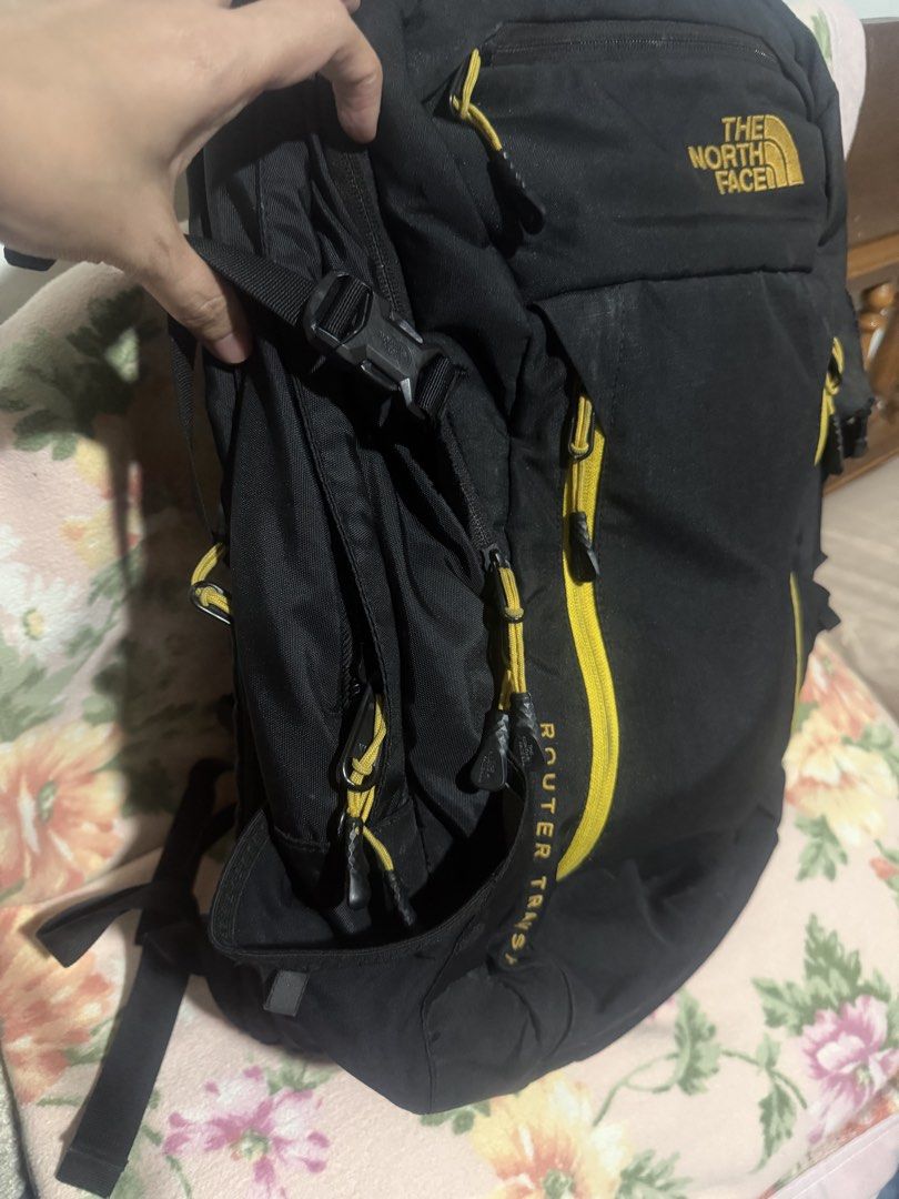 The North face router transit backpack (Category: Backpacks) located in San Pablo. Submitted by prelovedbymistyblue (Listing ID 1421904468, Image 3). Description: Original TNF backpack. With 3 major compartment (1 for laptop) and 2 small front pocket. The 2 open side pocket are quite loose. With holo sticker. The back strap was already sewn manually due to use. You may have it repaired at a bag repair shop like Mr quickie. Measures 14 x 17.5 x 7 