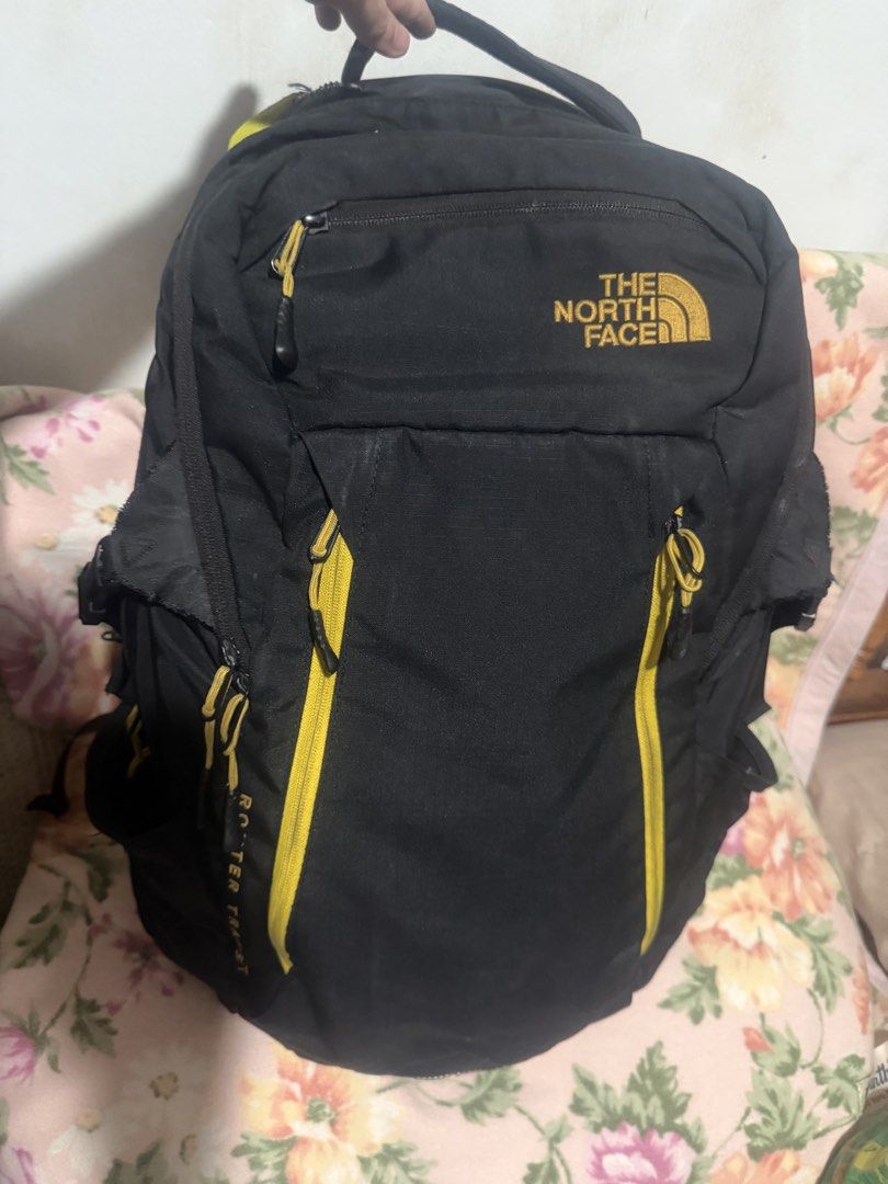 The North face router transit backpack (Category: Backpacks) located in San Pablo. Submitted by prelovedbymistyblue (Listing ID 1421904468, Image 1). Description: Original TNF backpack. With 3 major compartment (1 for laptop) and 2 small front pocket. The 2 open side pocket are quite loose. With holo sticker. The back strap was already sewn manually due to use. You may have it repaired at a bag repair shop like Mr quickie. Measures 14 x 17.5 x 7 
