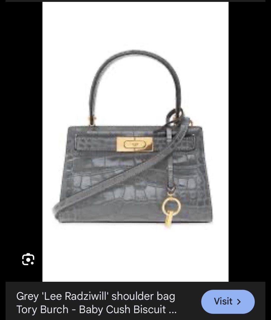 Tory Burch Lee Radziwill Shoulder Bag (Category: Luxury Bags & Wallets) located in Quezon City. Submitted by ___r. (Listing ID 1421805868, Image 2). Description: - Tory Burch Lee Radziwill Shoulder Bag - Color: Grey - Exterior: Croc-embossed leather - Features: Top handle, detachable crossbody strap - Hardware: Signature lock-and-key - Interior: Card slot - Includes: Dust bag - Design: Structured silhouette.