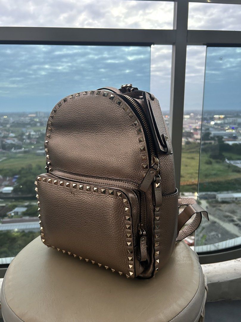 Valentino Metallic Beige Pebbled Leather Mini Rockstud Backpack (Category: Luxury Bags & Wallets) located in Taguig. Submitted by chibengco (Listing ID 1421881002, Image 1). Description: .