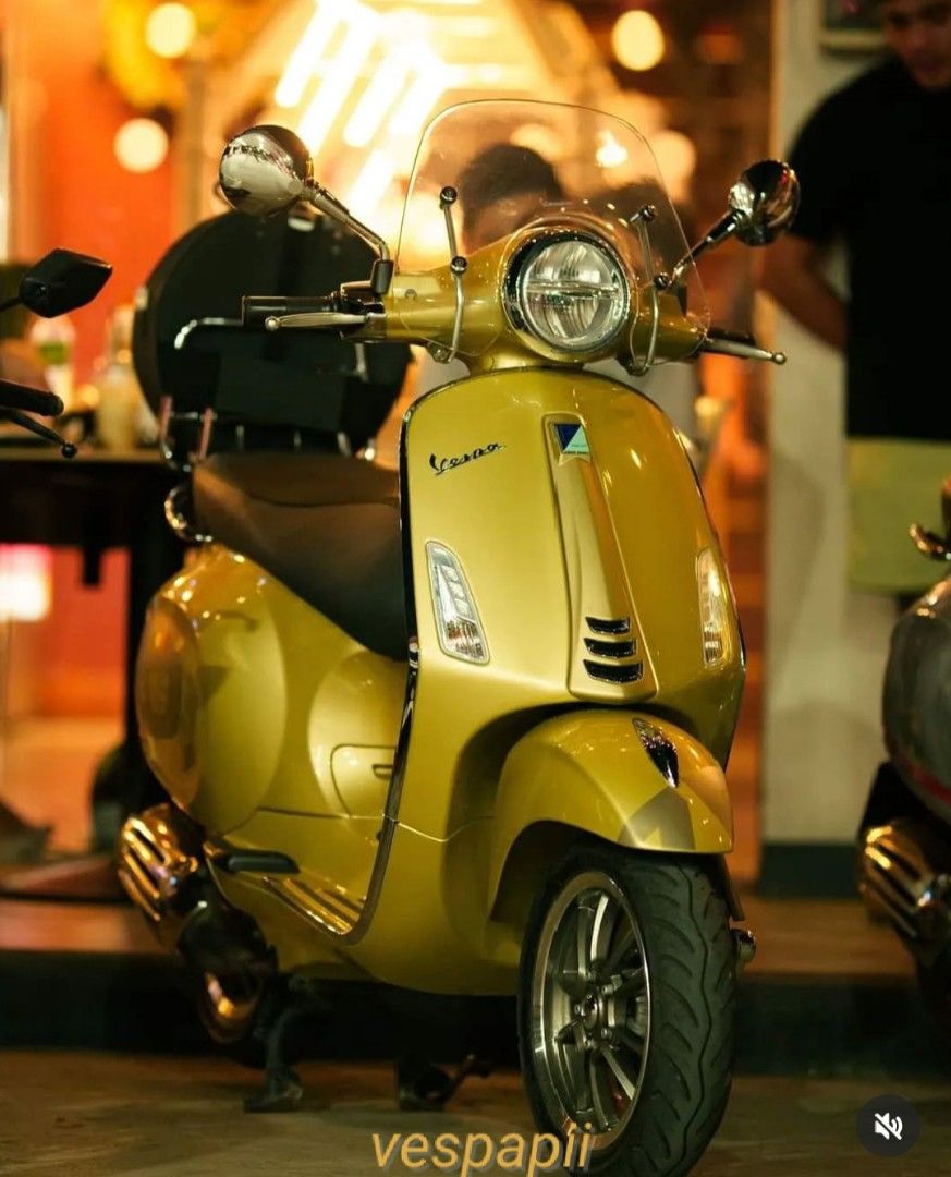 Vespa Primavera 75th Anniversary Edition (Category: Motorbikes for Sale) located in Cebu City. Submitted by giovannigiorgio (Listing ID 1408067012, Image 1). Description: Vespa Primavera is the 75th Anniversary Edition. It features a unique gold color and the number "75" prominently displayed. The original manual and a special edition box are included. It has a black seat and silver accents. Vespa primavera 150cc 75th limited anniversary edition 