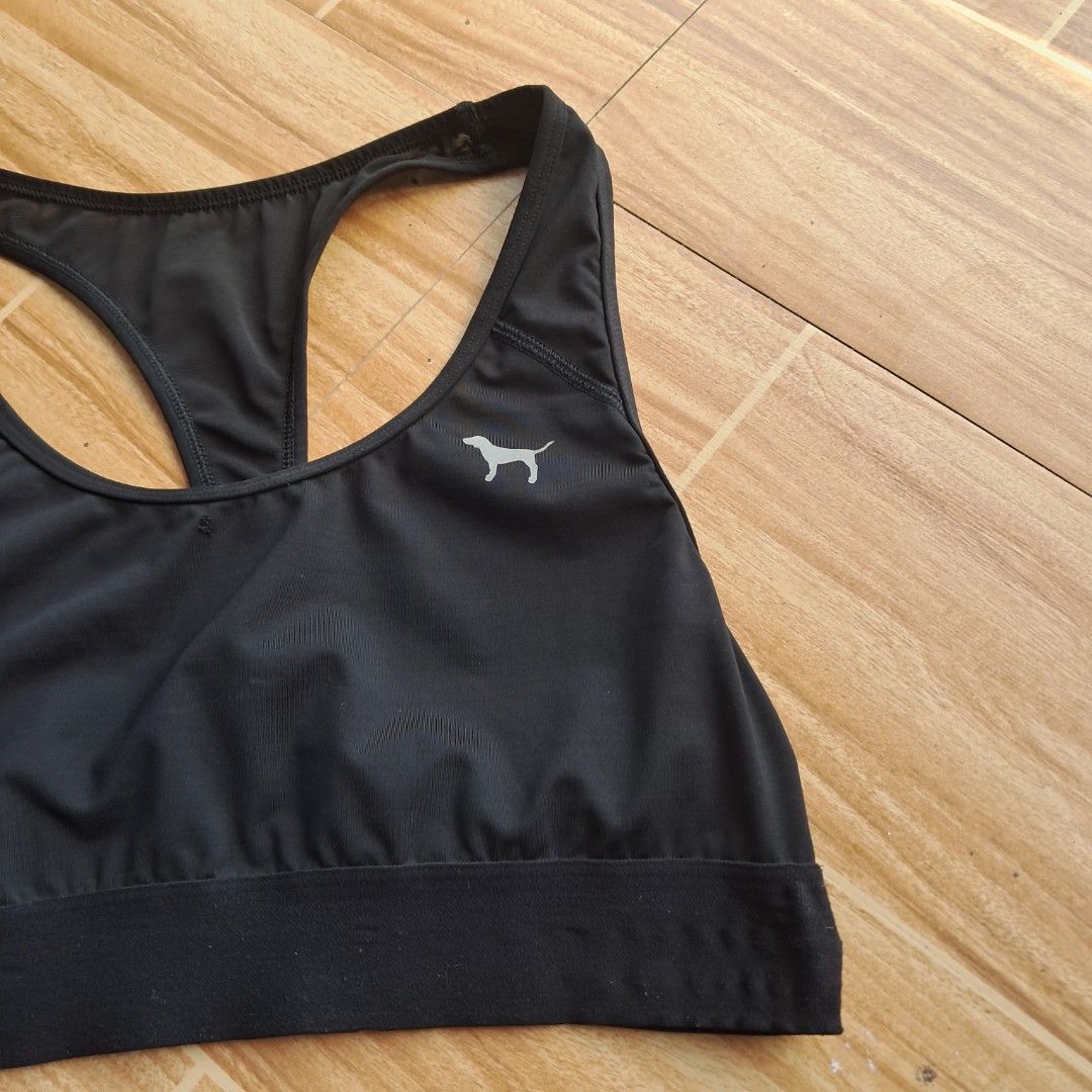 Victoria's Secret PINK Ultimate Sports Bra in black featuring the signature dog logo (Category: Activewear) located in Digos. Submitted by richcaliforniaclothingstore (Listing ID 1421845851, Image 2). Description: ○ Color may vary due to lighting. Size: L on tag This sports bra is designed for low to medium-impact activities, making it a versatile choice for both exercise and daily wear..