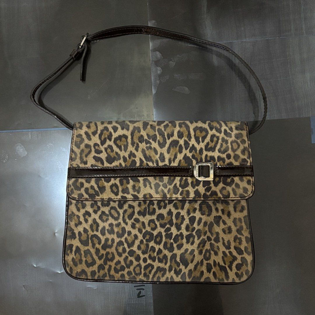 vintage dolce & gabbana suede leopard purse (Category: Luxury Bags & Wallets) located in Makati City. Submitted by metalsmith (Listing ID 1421840516, Image 1). Description: snap button needs replacing clean interior.
