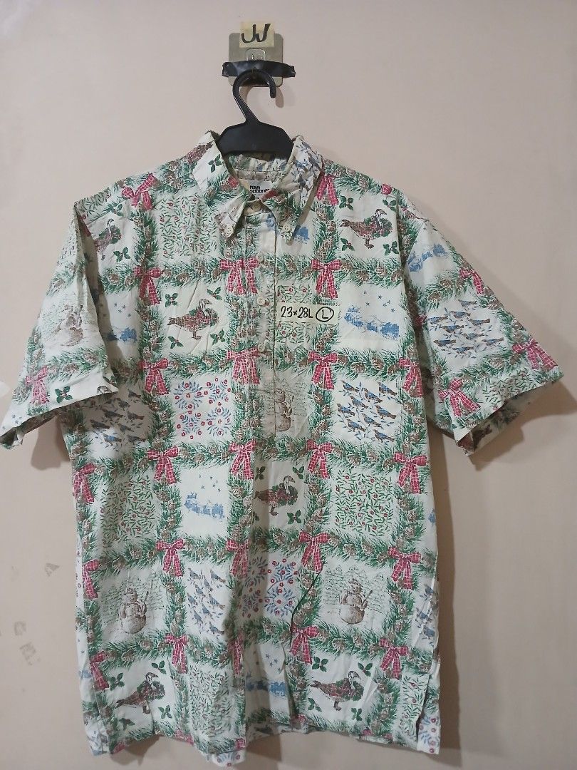 Vintage Printed Button-Down Shirt - Large (Category: Tshirts & Polo Shirts ) located in Caloocan City. Submitted by erickaban14 (Listing ID 1421917308, Image 1). Description: - Vintage button-down shirt - Size: Large - Unique printed design - Colors: White, Green, Pink - Collared neckline - Long sleeves - Classic button-down style.