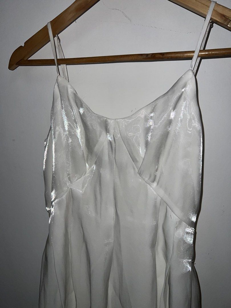 White Slip Dress (Category: Dresses) located in Cavite. Submitted by cssndrakateg (Listing ID 1421924270, Image 2). Description: - White slip dress - Features spaghetti straps - Flattering silhouette - Subtle sheen - Perfect for special occasions - Made of lightweight, flowing fabric.