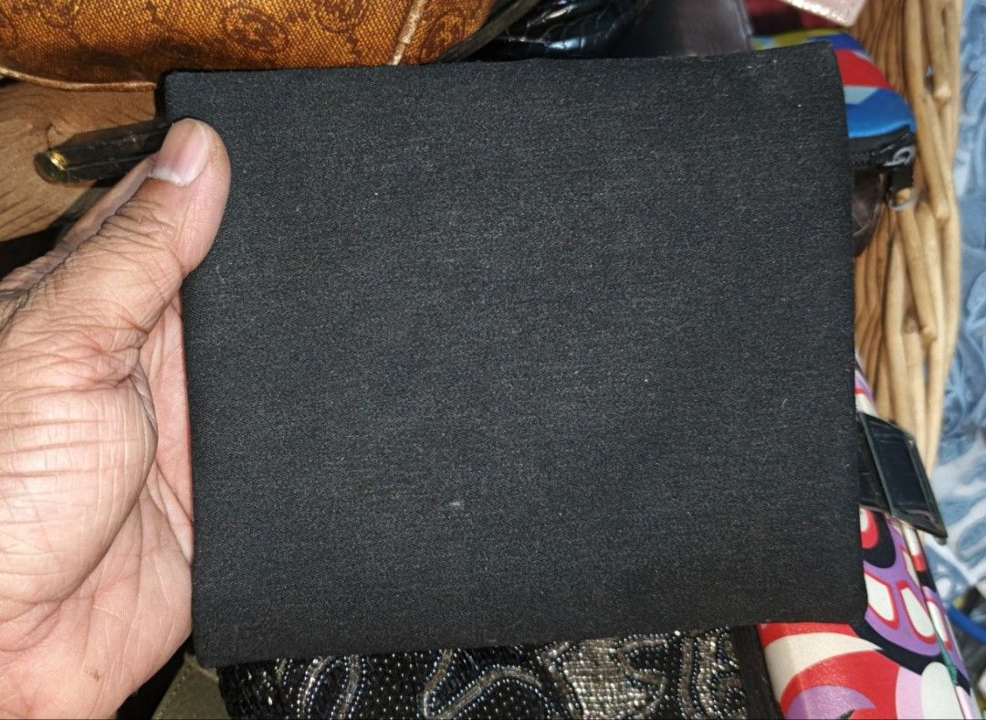 YSL Black Pouch with Pink Zipper (Category: Luxury Bags & Wallets) located in Polomolok. Submitted by dkljapansurplus (Listing ID 1421906287, Image 2). Description: - YSL pouch - Pink zipper - YSL logo - Black fabric material - Black interior - Pink patterned loop.