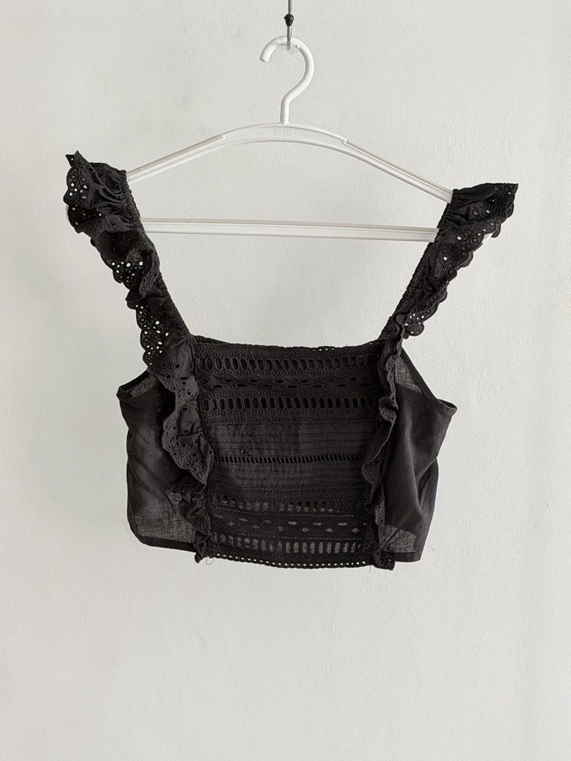 Zara Black Eyelet Crop Top (Category: Sleeveless) located in Taguig. Submitted by issa23fourfive (Listing ID 1421844555, Image 1). Description: - Zara Black crop top - Eyelet detailing - Ruffled straps - Square neckline - Smocked back panel 🌼Mode of Payment: Gcash BPI Maya 🌼Mode of Delivery: Grab Express/Lalamove .